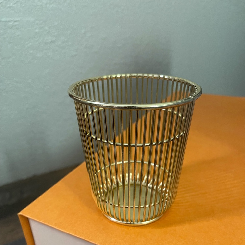 A holder for your brushes, pencils, etc.